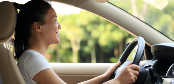 Asian Woman Driving